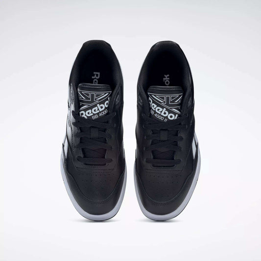 Top view of a pair of Reebok BB 4000 II Shoes in black, showing white soles and laces, the Reebok logo on the tongue, and a clean design set against a light gray background.