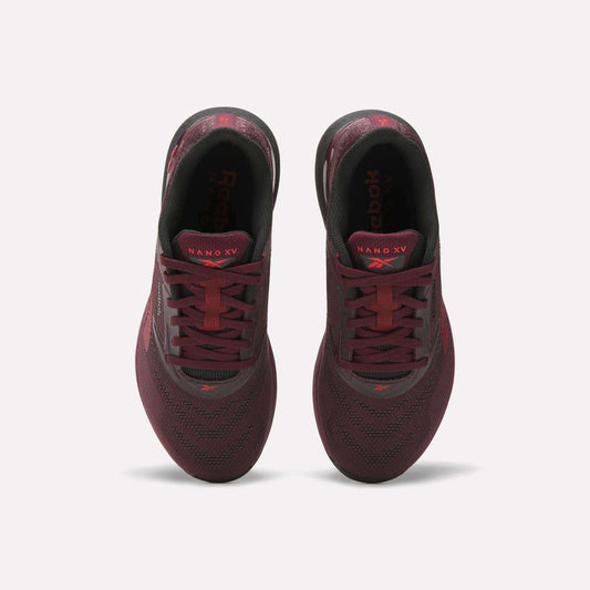 A pair of maroon and black Reebok Women's Nano X5 Training Shoes viewed from above, highlighting the laces, mesh texture, and Nano X5 label on each tongue.