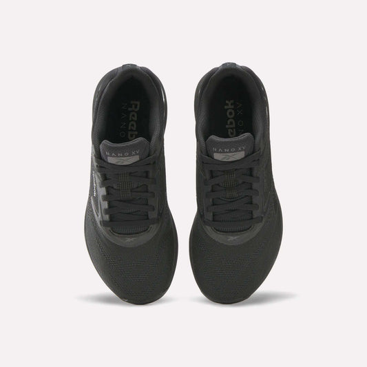 Top view of a pair of black Reebok Women's Nano X5 Training Shoes with black laces and NANO X5 on each tongue, placed side by side on a white background; ideal for women seeking both style and performance.