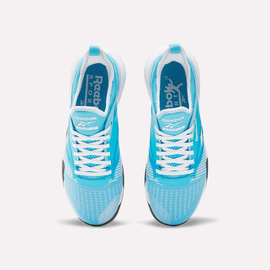 A pair of bright blue Reebok Nano Court Shoes seen from above, featuring white laces, multidirectional traction soles, and Reebok branding on the insoles and sides, set against a plain light background.
