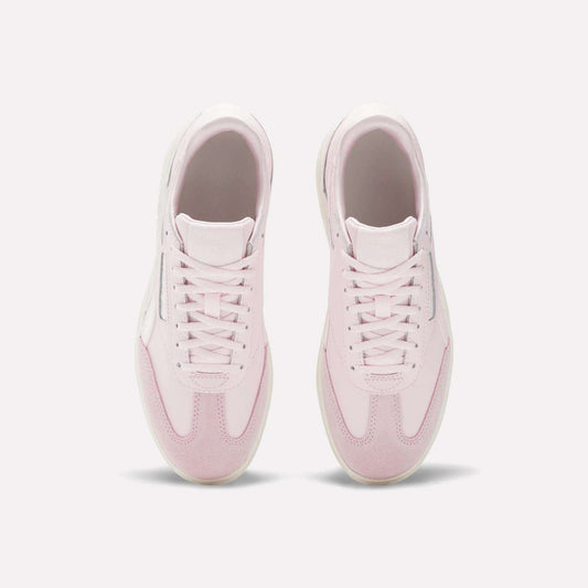 The Reebok Campio XT Double Shoes - Big Kids are stylish pink and white retro sneakers, perfect for girls.