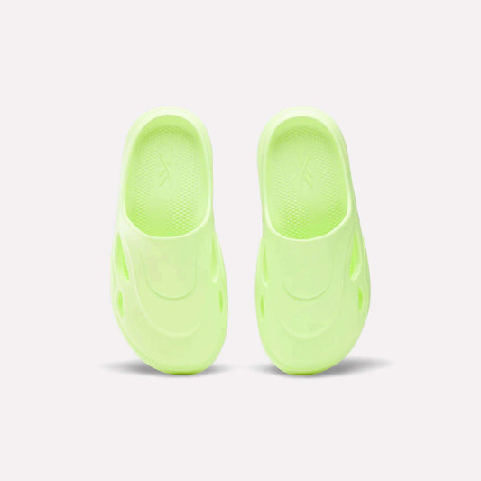 A pair of Reebok DMX Recovery Mules in green, crafted from molded EVA for comfort.