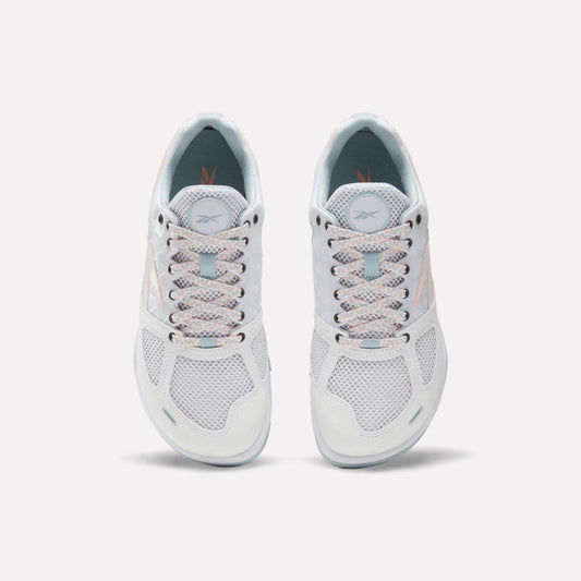 Reebok Women's Nano 2.0 Training Shoes feature white mesh uppers, light blue interiors, and light laces—designed for functional fitness and shown top-down on a plain white background.