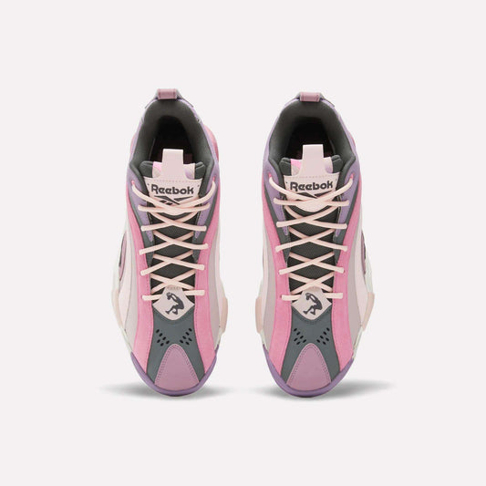 Top view of Reebok Shaqnosis Low Shoes in pink, lavender, grey, and white with wave-like patterns and the Reebok logo on the tongue—blending classic Shaqnosis basketball style with modern updates.