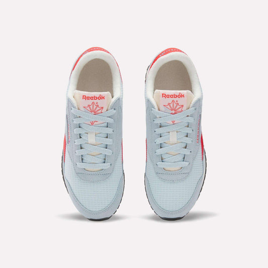A pair of Women's Classic AZ Shoes by Reebok seen from above, with light blue uppers, white laces, beige interiors, and bright pink Reebok logos—retro running-inspired style with fresh pops of color.