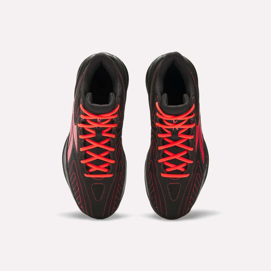 Top view of a pair of Reebok Press Retro Basketball Shoes in black with bright red laces, red stitching, and EVA cushioning, displayed side by side on a plain white background.