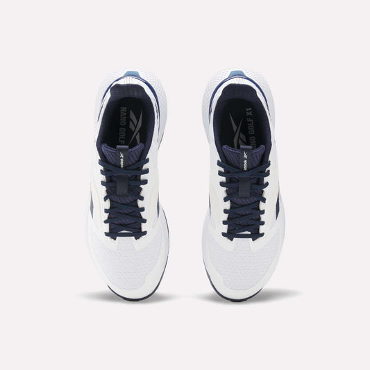 Top view of a pair of Reebok Nano Golf Shoes with white FlexWeave uppers, dark blue laces and accents. The performance shoes are side by side, facing forward on a light background.