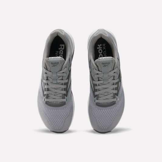 A pair of gray Reebok Nano X4 Training Shoes seen from above, showing the laces, mesh texture, and Reebok branding on the tongue and insole, featuring Floatride Energy Foam for enhanced comfort.