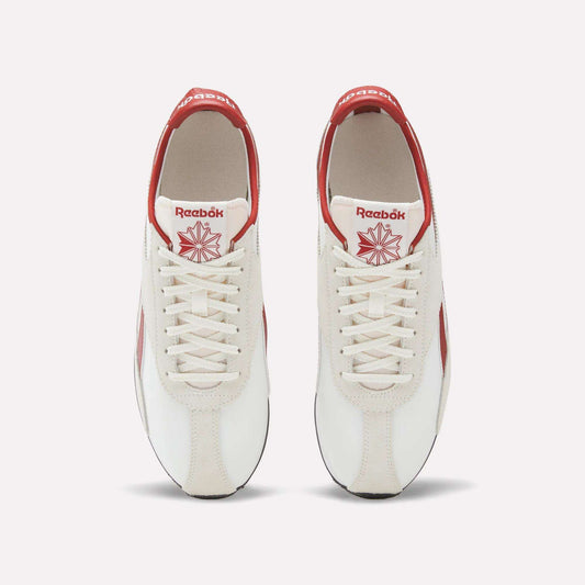 Top view of a pair of Reebok R400 Shoes in white with red accents, featuring white laces and red Reebok logos on the tongue and heel. These vintage Reebok sneakers are placed side by side on a plain background.