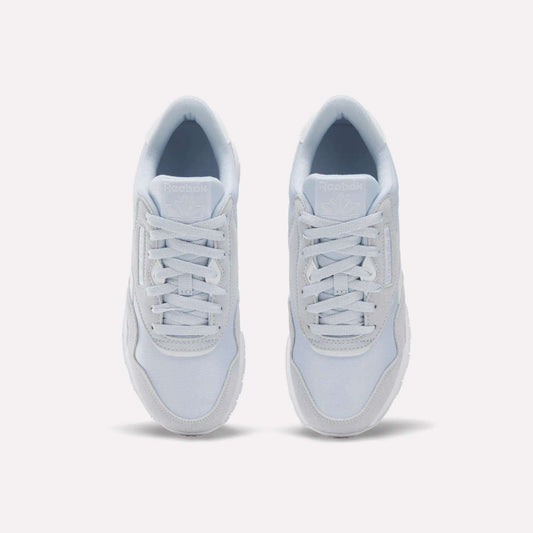 A pair of Reebok Women's Classic Nylon Shoes in white are shown from a top-down view with the laces neatly tied, set against a plain white background.