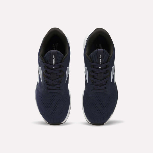 Top view of Reebok Men's Nanoflex Trainer 2 Shoes featuring navy blue uppers, white soles, and black interiors, displayed side by side on a plain white background.