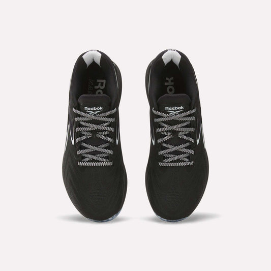 Top view of Reebok Nano X5 Edge Training Shoes—black with white accents and patterned laces—side by side on a light background, built for peak performance.