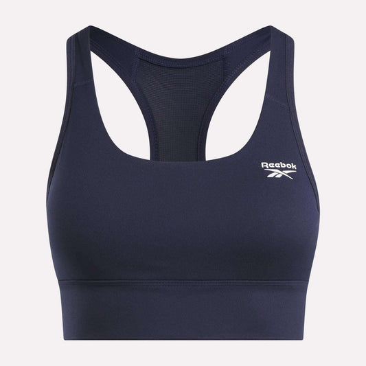 The Reebok Women's Rush Medium-Impact Sports Bra features a navy blue racerback design, mesh back panel, and a white logo on the left chest—perfect for medium-impact workouts.