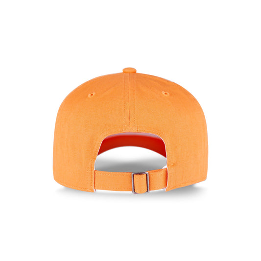 The Reebok Logo Cap in orange cotton twill is shown from the back, featuring an adjustable metal buckle closure and two stitched ventilation eyelets on each side.