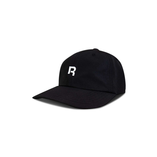 The Reebok Drop R Court Cap is a black baseball cap featuring a white embroidered letter R on the front, shown against a white background.