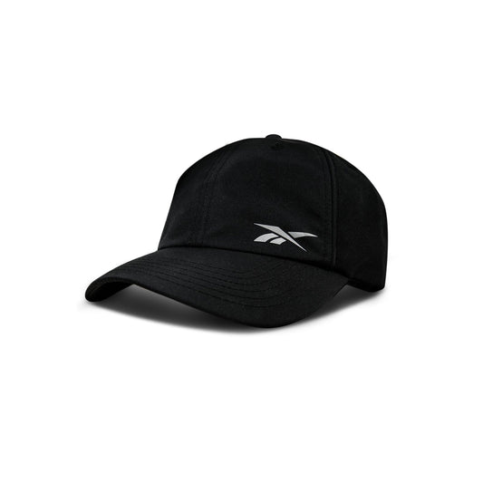 The Reebok Flow Piped Cap, in black with a curved brim and white Reebok logo on the front, features a moisture-wicking sweatband and is shown on a plain white background.