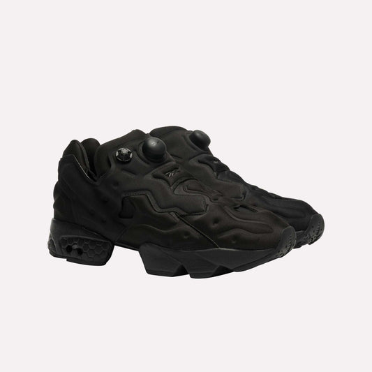 The Reebok Instapump Sliver LTD Shoes are all-black athletic sneakers with a textured futuristic design, chunky soles, and Hexalite cushioning, shown against a plain white background.