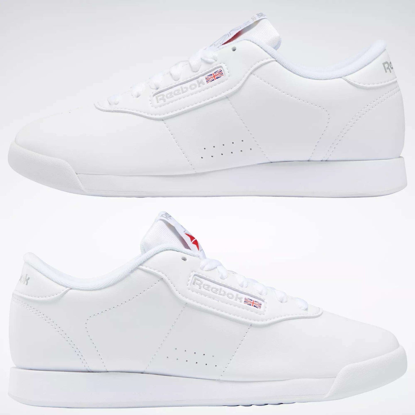 Two side views of Reebok Women's Princess Shoes in classic white, featuring cushioned soles, laces, subtle side branding, and heritage-inspired details like a small Union Jack flag next to the Reebok logo.