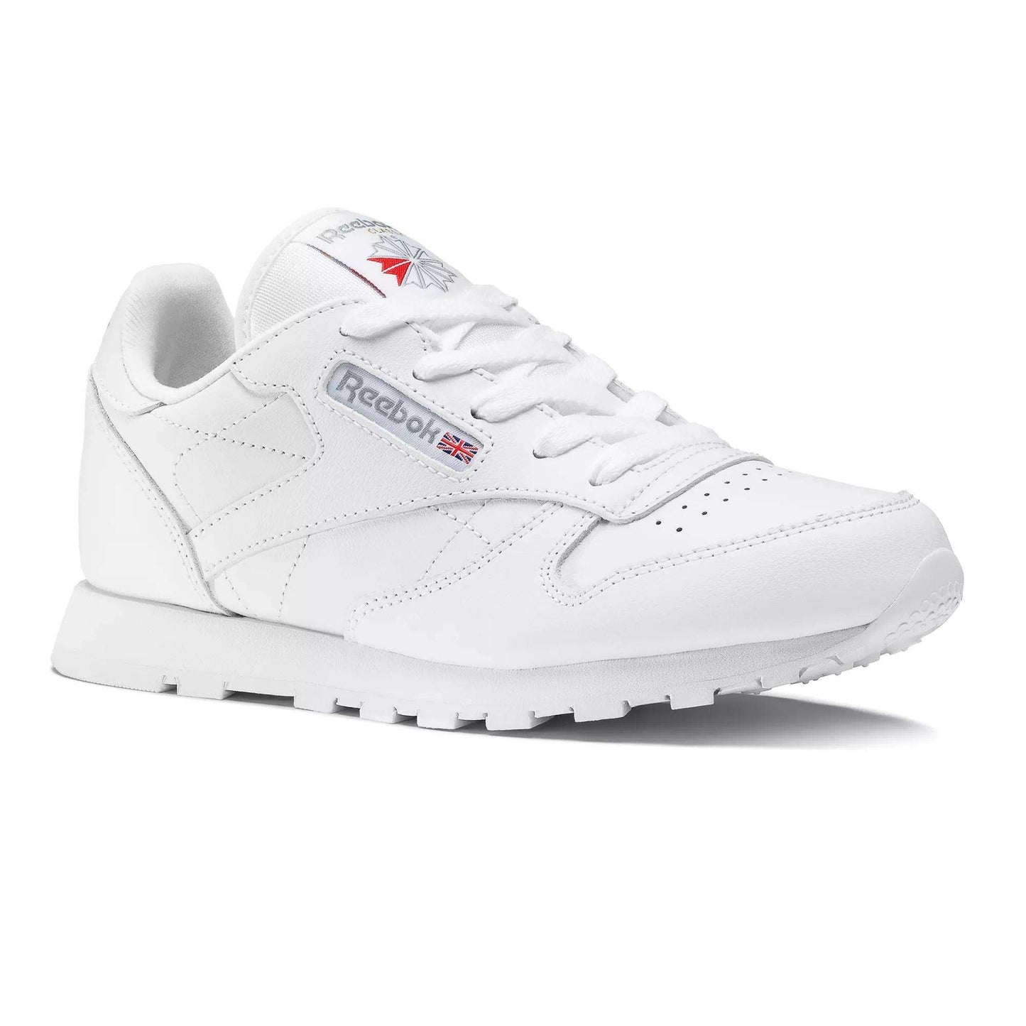 The Reebok Kids' Classic Leather Shoes - Preschool features a white leather upper, low-top design, visible stitching, lace-up front, and Reebok branding with the UK flag on the side and tongue, displayed on a plain white background.