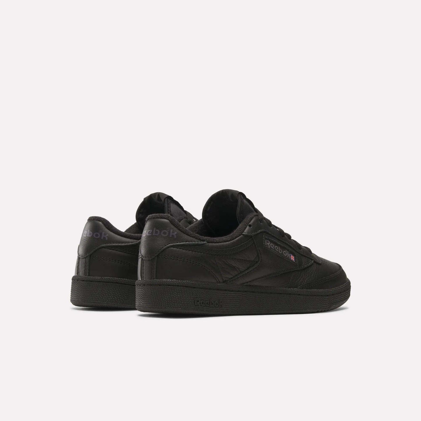 A pair of Reebok Club C 85 Shoes is displayed on a plain white background, with one shoe angled forward and the other turned to reveal its outer side and back.