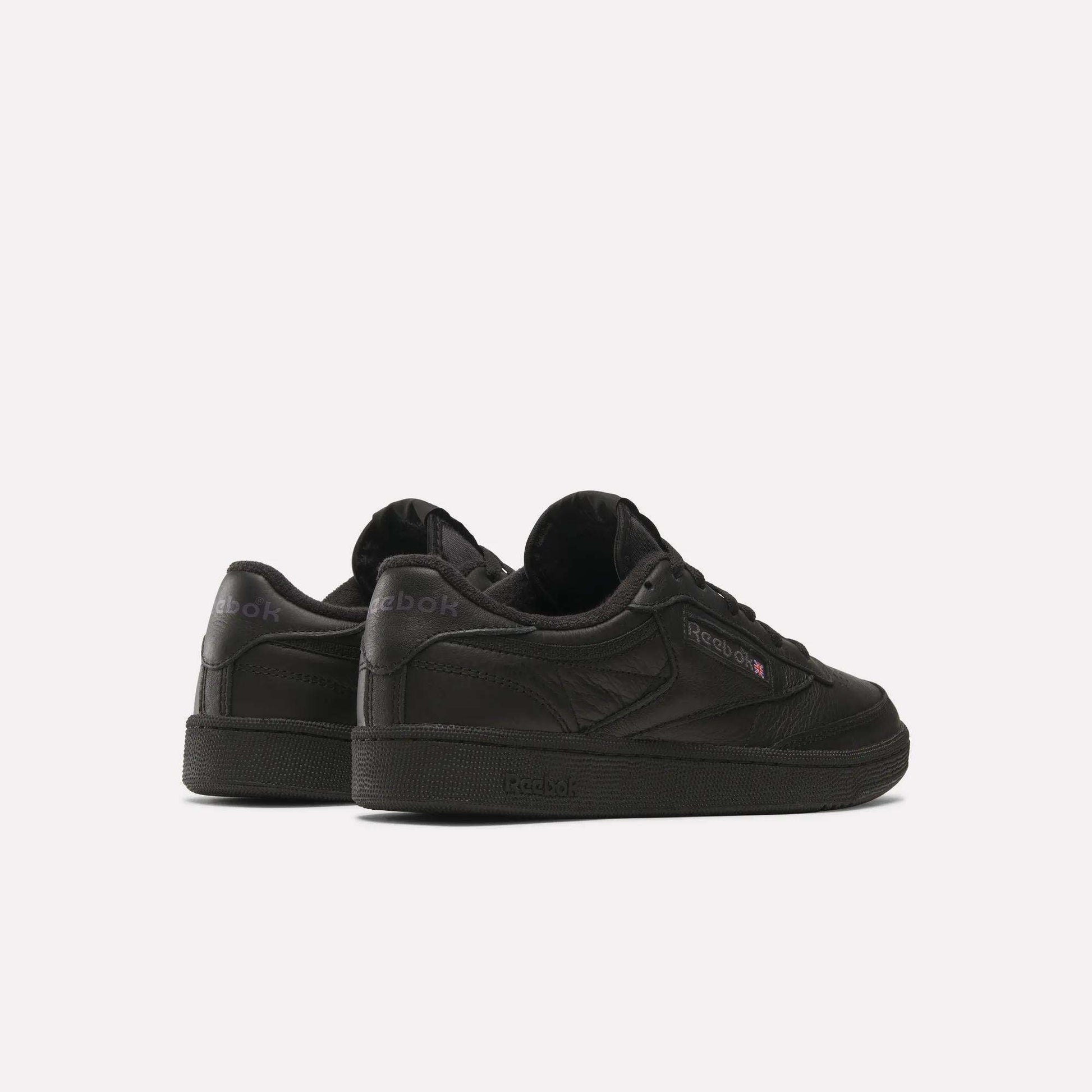 A pair of Reebok Club C 85 Shoes is displayed on a plain white background, with one shoe angled forward and the other turned to reveal its outer side and back.
