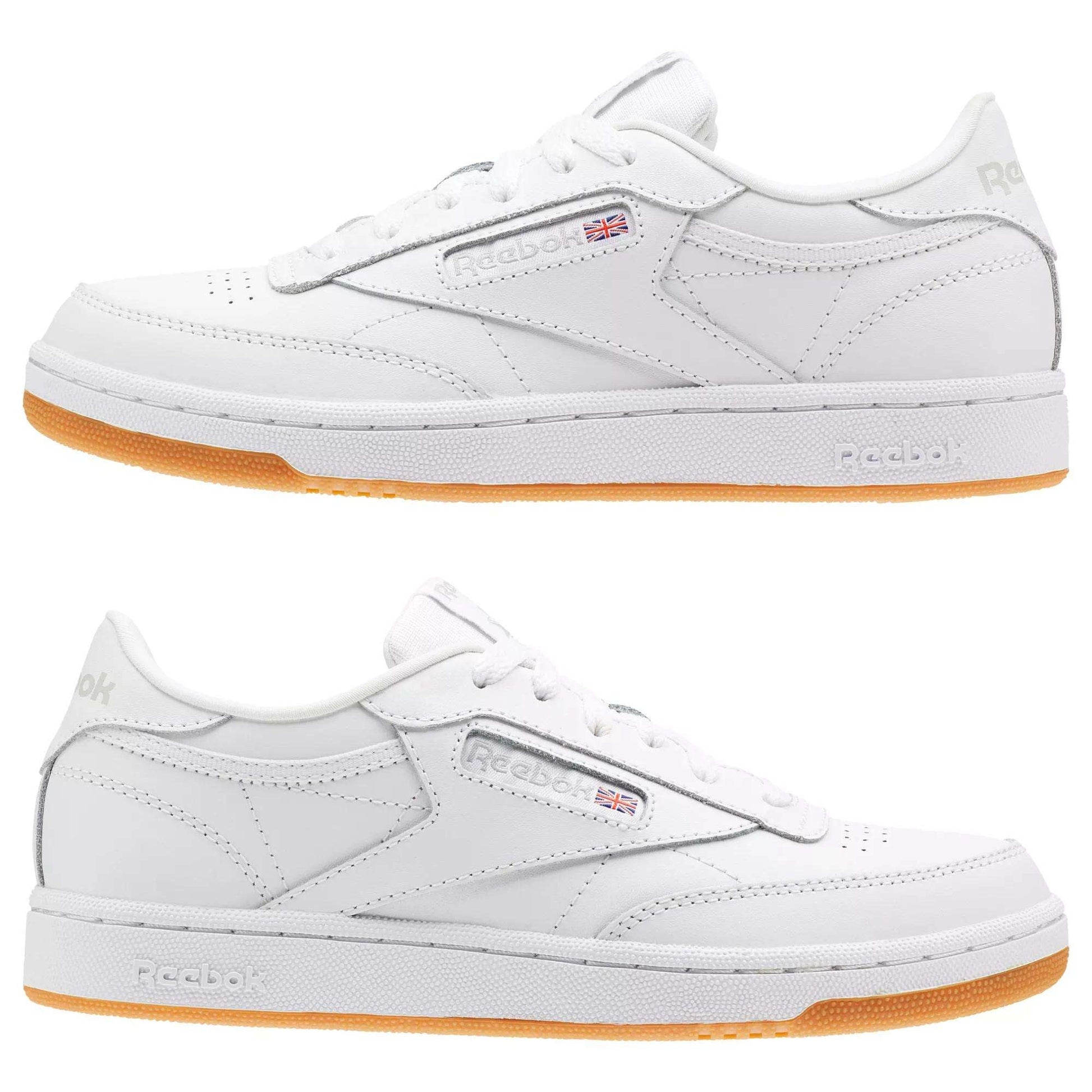 A side view of Reebok Kids' Club C Shoes - Grade School in classic white, featuring soft leather uppers, gum rubber soles, stitched details, side Reebok logo, and a low-cut design on a white background.