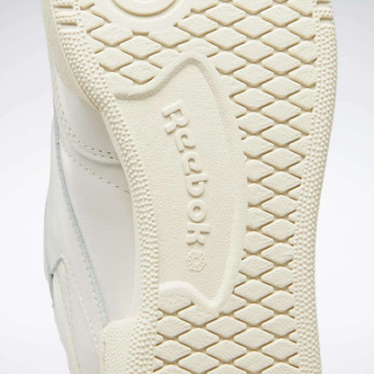 Close-up of the off-white sole of the Reebok Club C 85 Vintage Shoes, featuring the iconic logo in raised letters and a diamond-textured pattern for grip. Designed for comfort with lightweight cushioning.