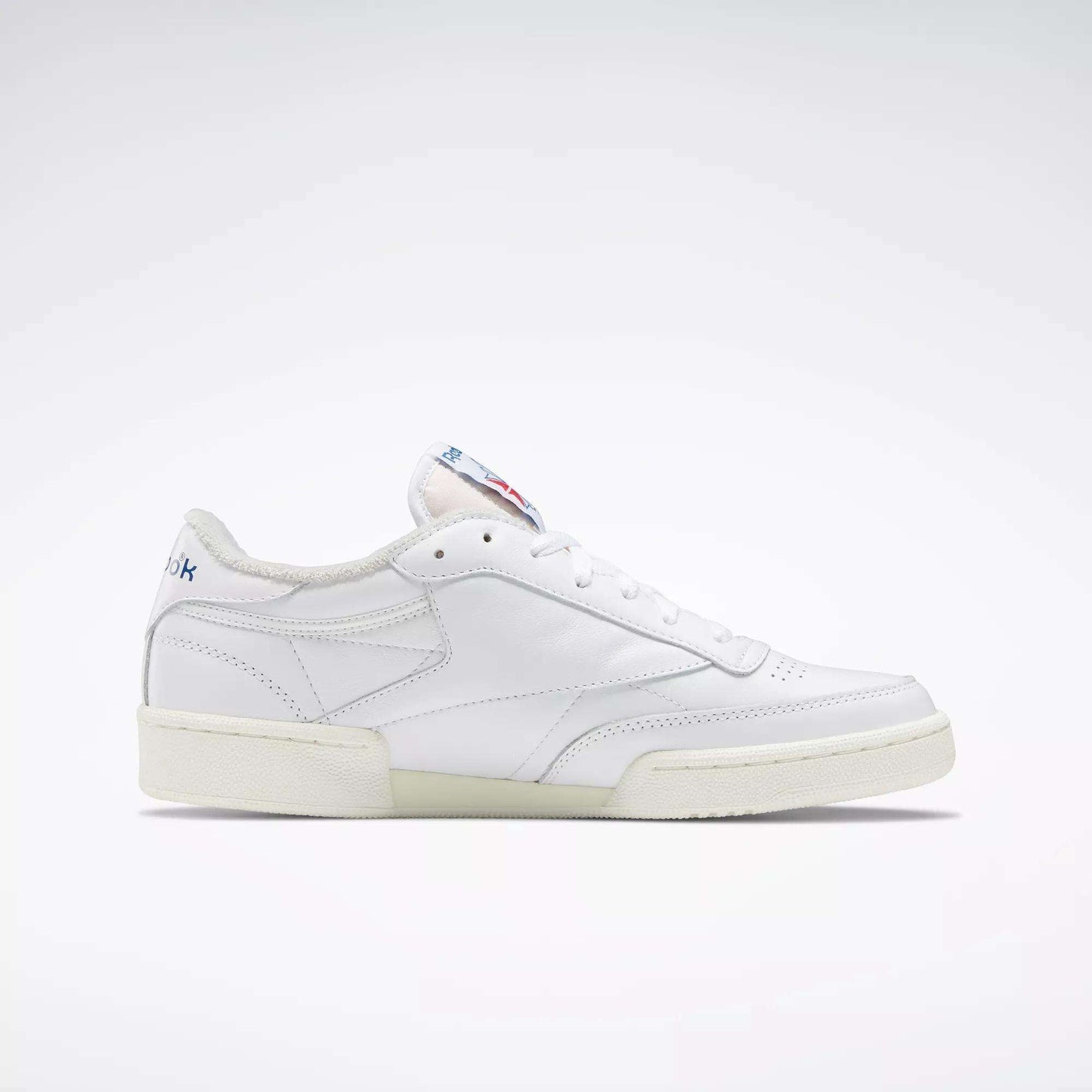 The Reebok Club C 85 Vintage Shoes feature a white leather upper, low-top design, off-white sole, and subtle stitching, shown against a plain light background.