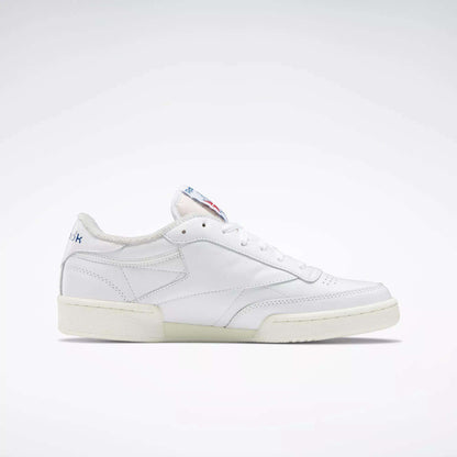 The Reebok Club C 85 Vintage Shoes feature a white leather upper, low-top design, off-white sole, and subtle stitching, shown against a plain light background.