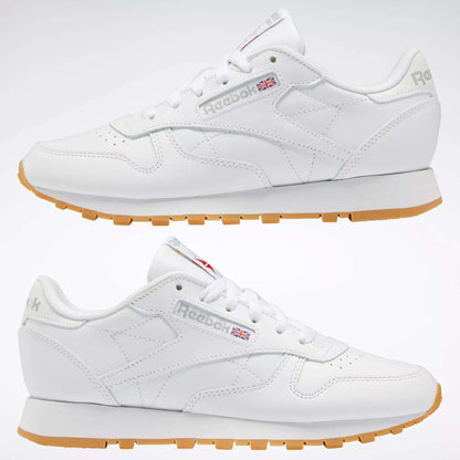 Two views of the Reebok Women's Classic Leather Shoes, featuring a cushioned midsole, gum soles, white laces, and the Reebok logo with a UK flag. This low-top design is ideal for those seeking stylish women’s leather sneakers.