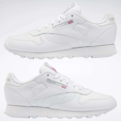 Reebok Women's Classic Leather Shoes with cushioned midsole, Reebok logo, and Union Jack flag on the side, shown in side profile against a plain light background.