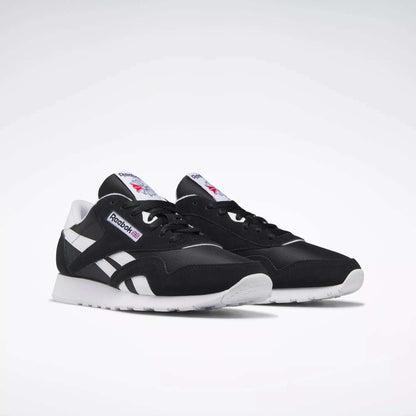 Men's Classic Nylon Shoes by Reebok in black and white, featuring the iconic logo on the side and tongue plus white soles, shown on a plain white background—perfect everyday sneakers for effortless style.