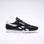 The Reebok Men's Classic Nylon Shoes in black and white feature white side stripes, a white sole, and signature Reebok logos—ideal everyday sneakers for men—displayed in a side profile on a plain light background.