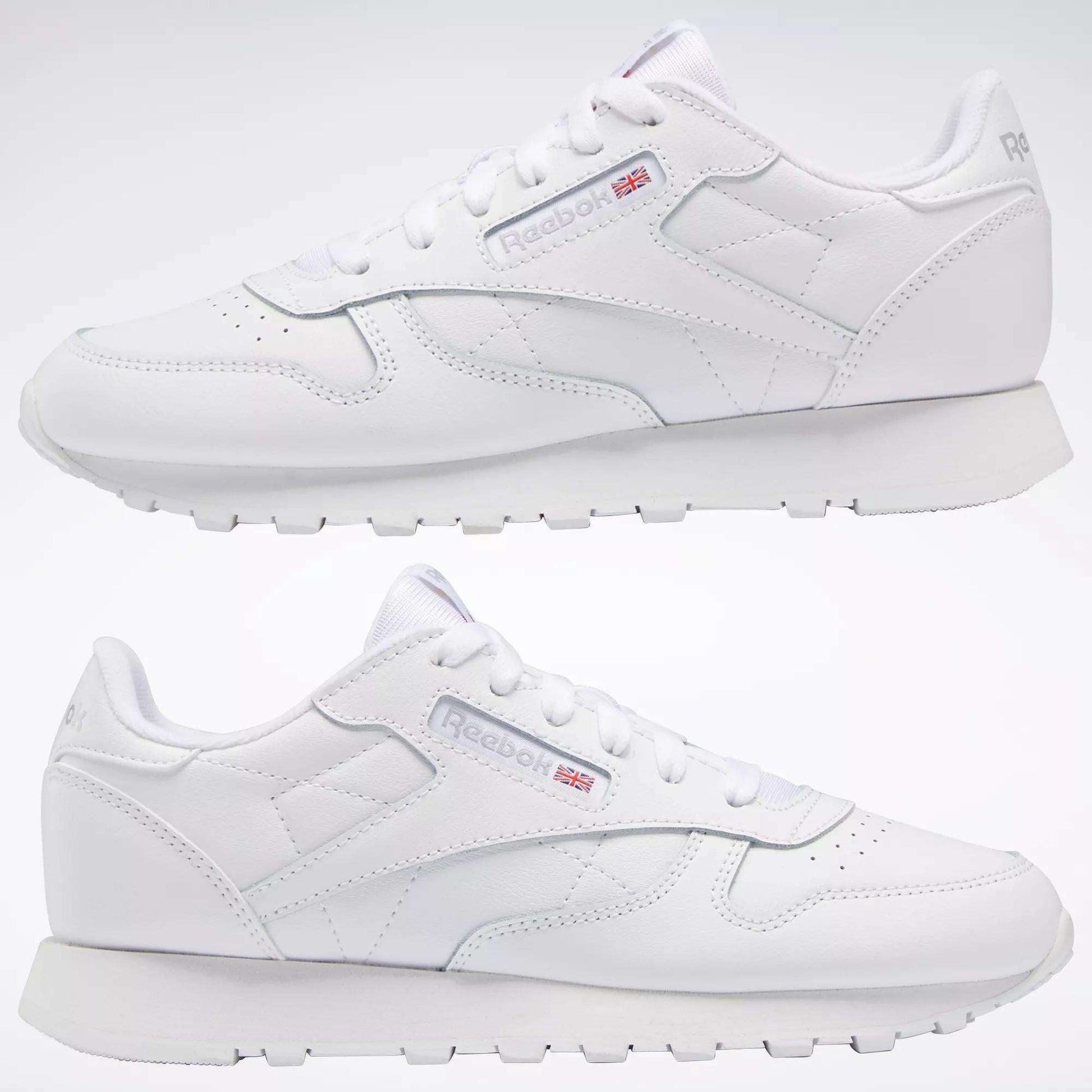 Two white Reebok Classic Leather Shoes - Big Kids are displayed side by side on a plain white background, showcasing the signature design and Reebok logo—ideal as stylish footwear for junior boys.