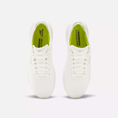 Top view of Reebok Active Lite Shoes with a breathable upper, white laces, and light green MEMORY TECH insoles, set against a plain white background.