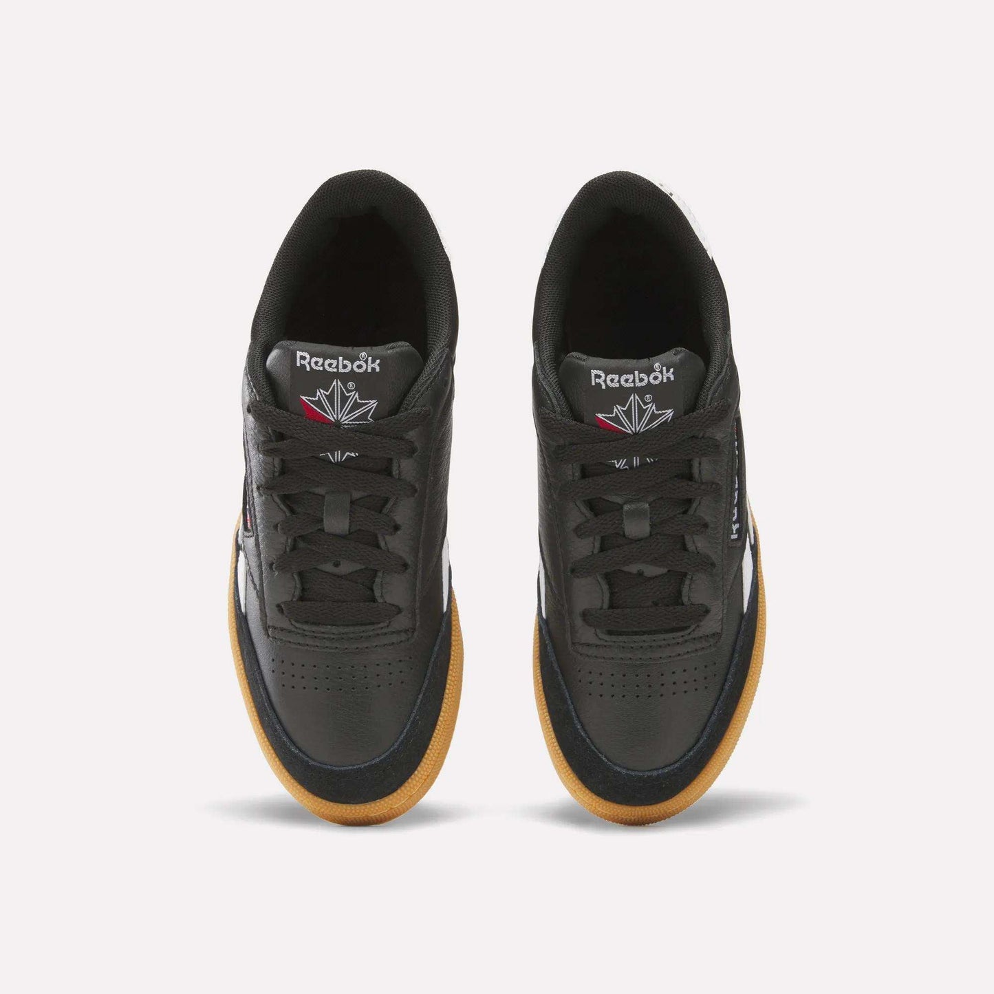 The Reebok Club C Revenge Vintage Shoes are black men's casual shoes made from soft leather, delivering comfort and retro style.