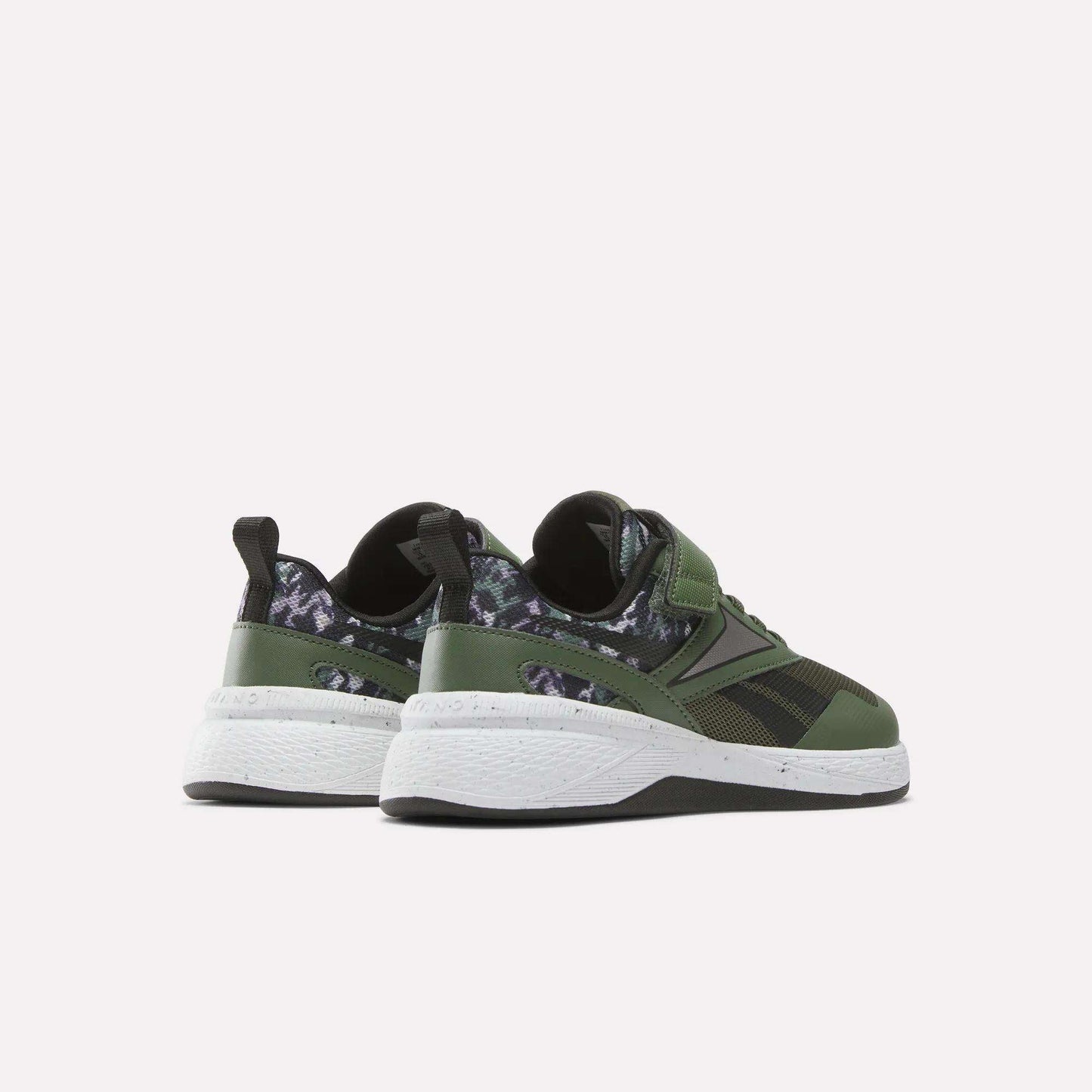 The Reebok Nano Play Stretch Lace And Top Strap Shoes for little kids are shown from the back in green with black and dark camo details, white soles, and black pull tabs—perfect as boys' training shoes in a kid-sized Nano style.