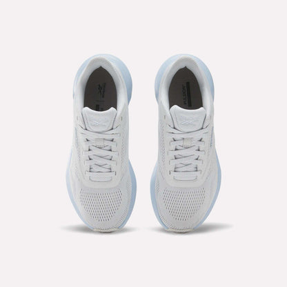 Top view of Reebok Women's Energen Run 4 Running Shoes featuring breathable mesh uppers and laces, placed side by side on a light background.