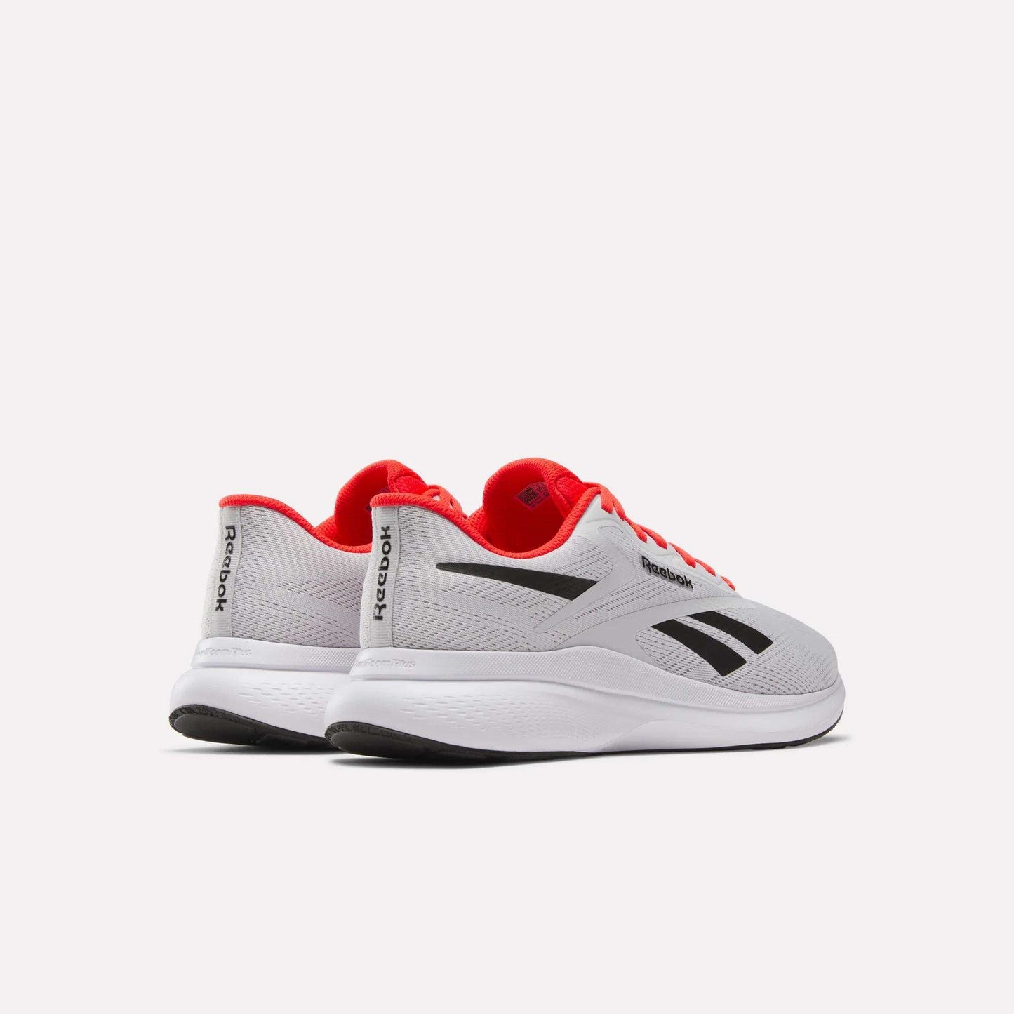 Men's Energen Run 4 Running Shoes by Reebok, in gray with black logos and red accents, feature breathable mesh and a FuelFoam midsole. Shown from the back and side against a plain white background.
