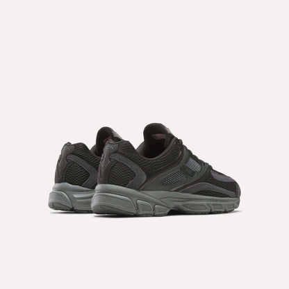 The Reebok Premier Trinity Shoes are stylish black retro runners, ideal for those seeking both comfort and fashion.