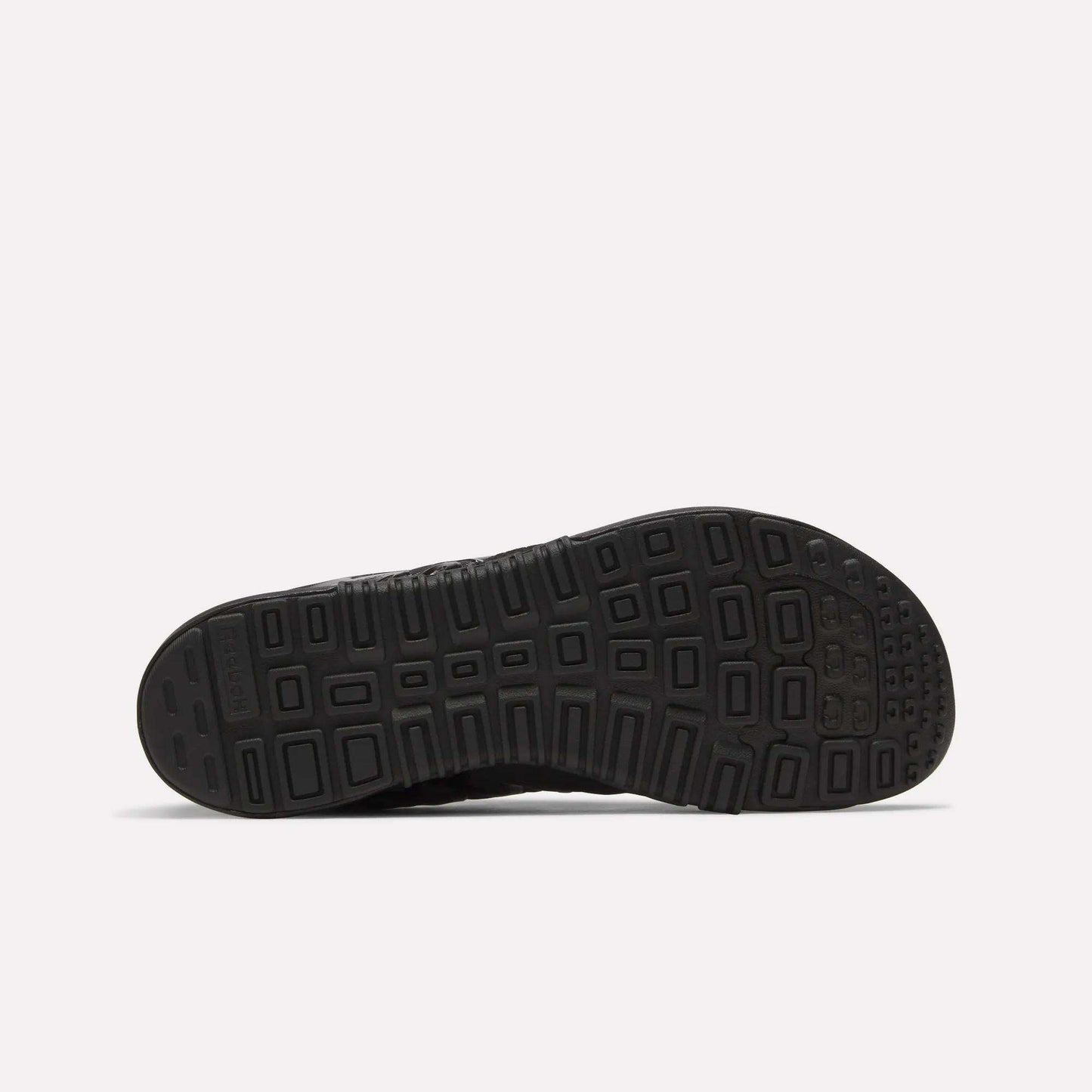 The textured black sole of the Reebok Men's Nano 2.0 Training Shoes features a geometric tread with rectangular and square shapes, shown from below against a white background—perfect for functional fitness.