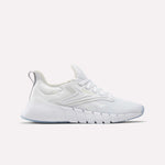 The Reebok Women's Nano Gym Training Shoes feature a white mesh upper, textured midsole, lace-up closure, and heel pull tab, shown in side profile against a plain light background.