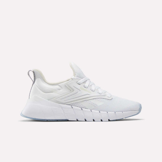 The Reebok Women's Nano Gym Training Shoes feature a white mesh upper, textured midsole, lace-up closure, and heel pull tab, shown in side profile against a plain light background.