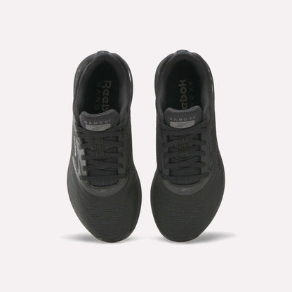 Top view of a pair of black Reebok Women's Nano X5 Training Shoes with black laces and NANO X5 on each tongue, placed side by side on a white background; ideal for women seeking both style and performance.