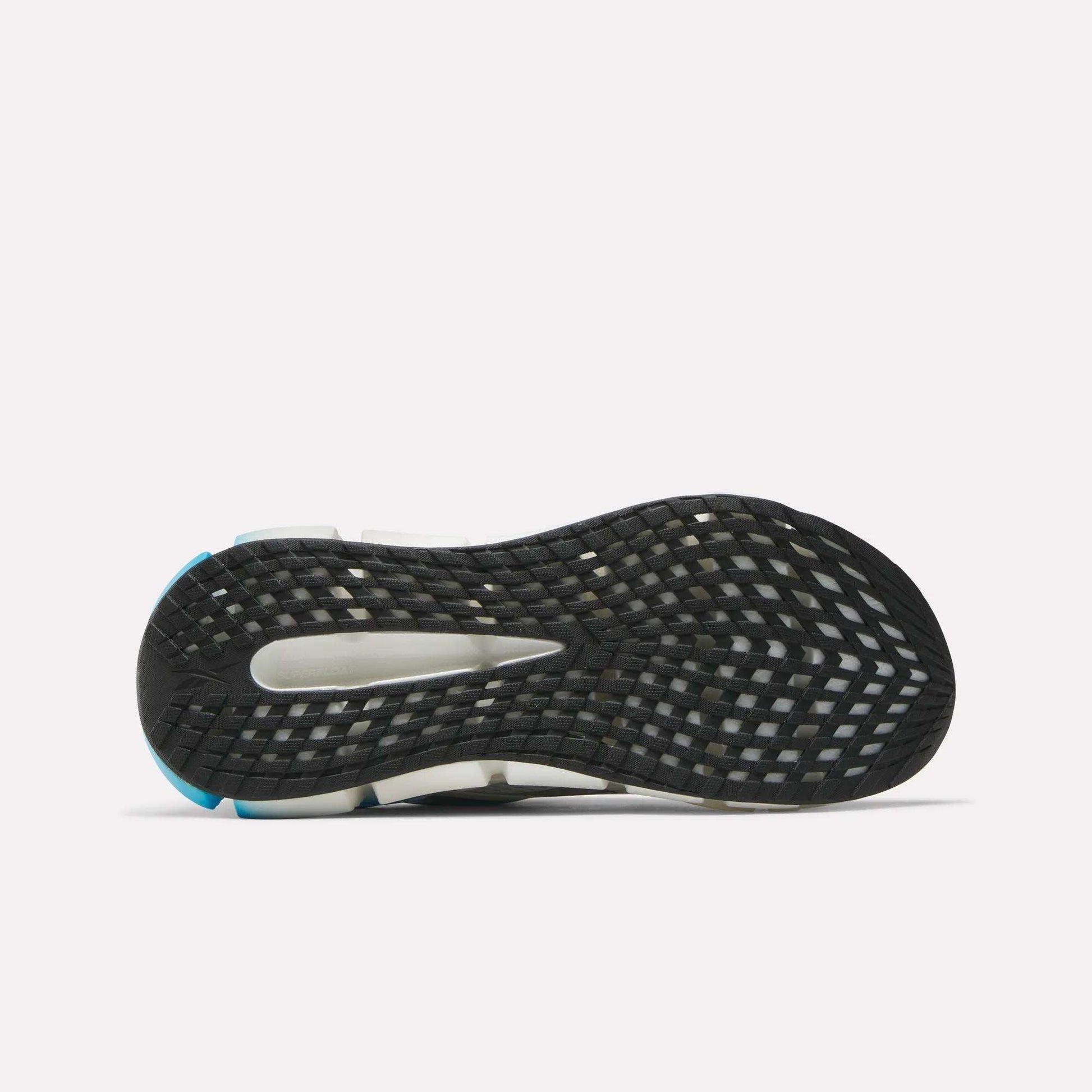 The image shows the sole of the Reebok Men's FloatZig 2 Running Shoes, mainly black with a grid-like tread and white and blue accents. A midfoot cut-out reveals the shoe’s energy-returning Superfloat+ cushioning.