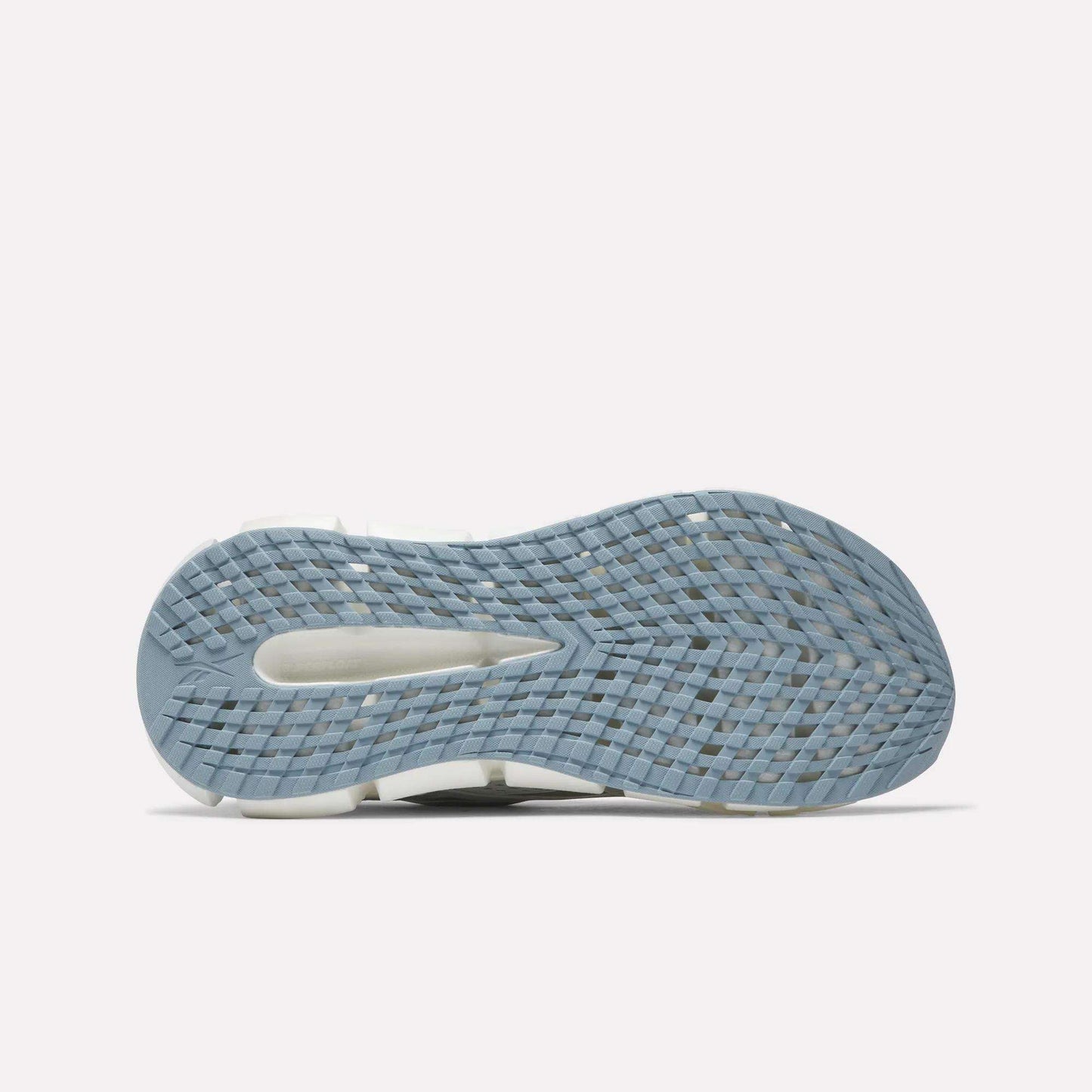 A close-up of the Reebok Women's FloatZig 2 Running Shoes highlights their Superfloat+ cushioning and durable carbon rubber outsole.