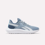 The Reebok Women's Energen Lux Running Shoes are light blue with white and dark blue accents, a white sole, and a mesh-like upper. Shown in side profile on a plain light background, these sneakers are lightweight for running.