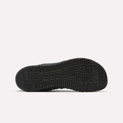 The image shows the Reebok Nano 2.0 Training Shoes’ black rubber outsole with a mix of rectangular grooves and textured areas for grip, set against a plain white background.