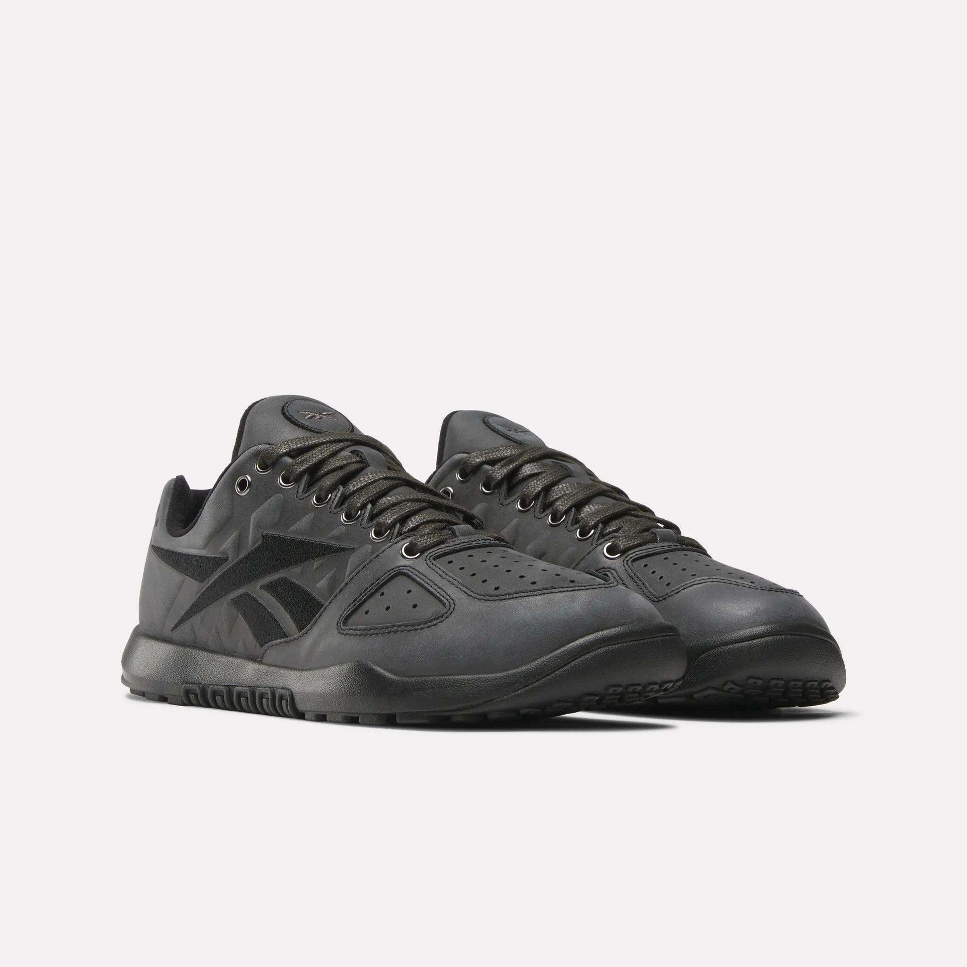 A pair of Reebok Nano 2.0 Training Shoes in black, featuring lace-up closures, perforated toe boxes, and textured rubber soles, displayed against a light background.