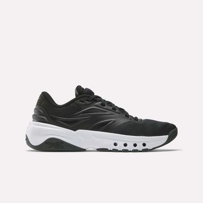 The Reebok Men's ERS Training Shoes in black feature premium cushioning and a thick white sole with circular cut-outs, displayed in a side view on a plain white background.